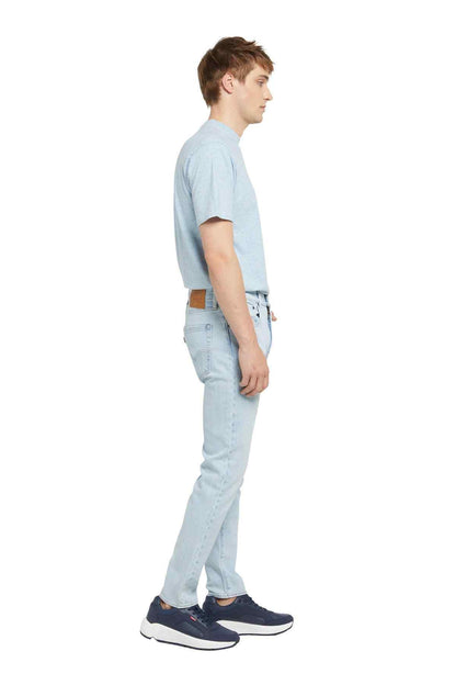 Levi's light blue jeans, side view with belt loops and straight leg