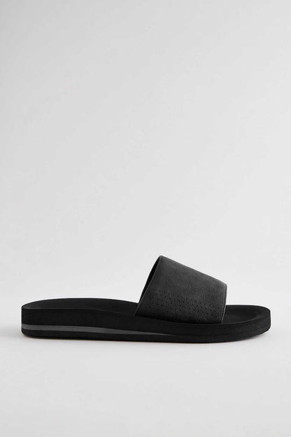 Black slide sandals with wide strap and low platform sole