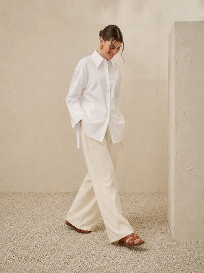Licci white button-up shirt & wide-leg trousers set, side view, tied sleeves