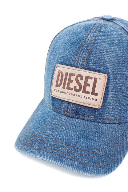 Blue denim cap with beige Diesel logo label on front