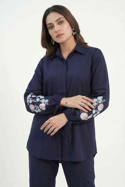 Navy blue tunic shirt and pants set, front view with floral sleeve embroidery