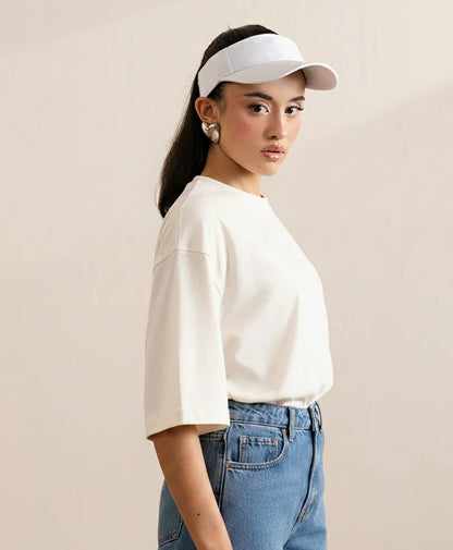White fitted crewneck T-shirt with short sleeves, side view