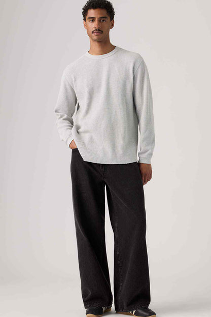 Black denim wide-leg jeans, relaxed fit with straight waistband and front pockets