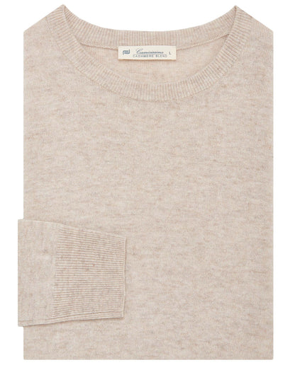 Cream knit sweater with ribbed crew neck and ribbed cuffs