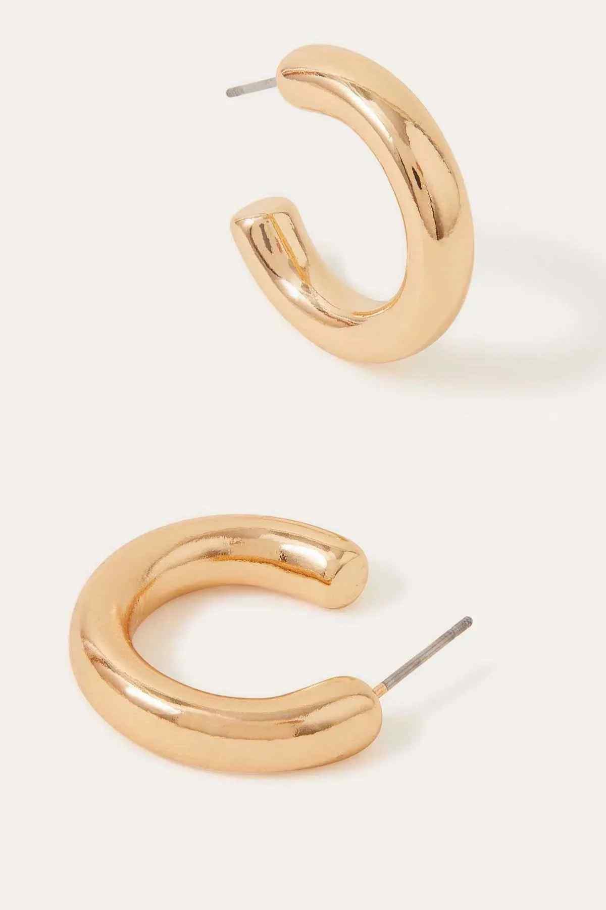 Gold hoop earrings, curved profile with post