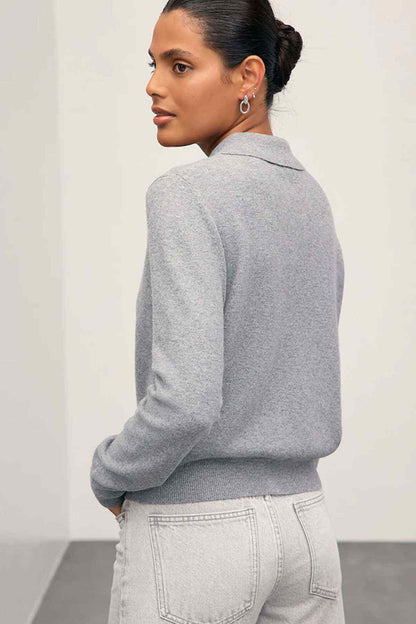 Light grey polo knit top back view with long sleeves and buttoned collar
