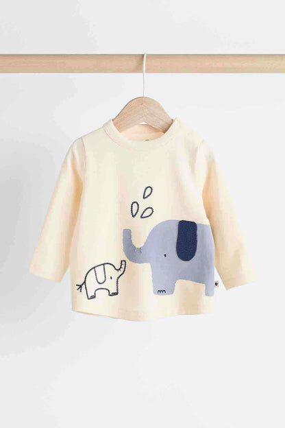 Cream long-sleeve kids shirt with blue animal graphic