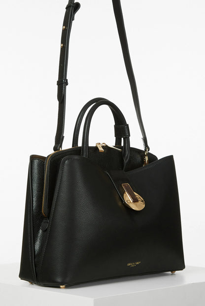 Black structured handbag with top handles, zip pocket, and gold-tone hardware