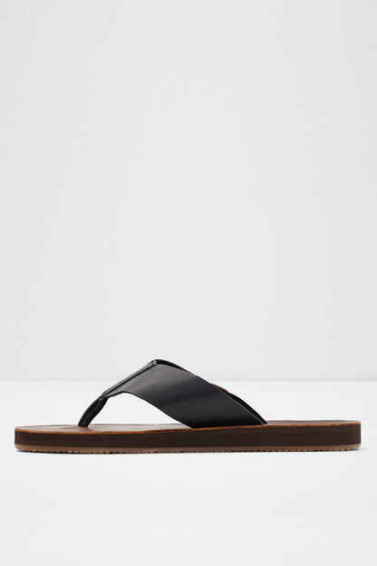 ALDO black slide sandals with wide strap and brown flat sole