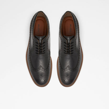 Pair of ALDO lace-up brogue oxford shoes, top view with tan sole welt