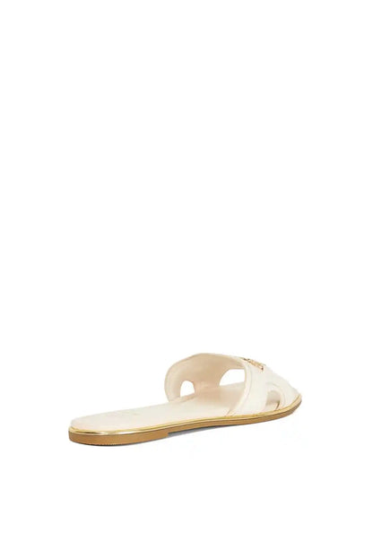 Ecru slide sandal with thin gold-trimmed sole and open upper