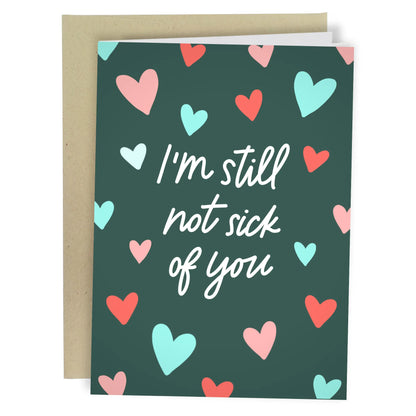 Heart-themed greeting card with text "I'm still not sick of you"