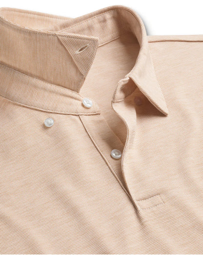 Charles Tyrwhitt polo collar close-up, light tan knit with button placket