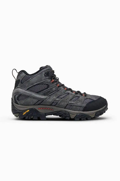 Dark hiking shoe with lace-up closure and rugged rubber outsole