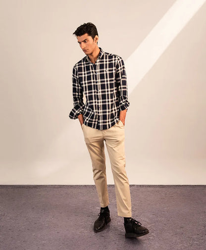 Men's fitted black-and-white plaid button-up shirt with chest pocket and button-front