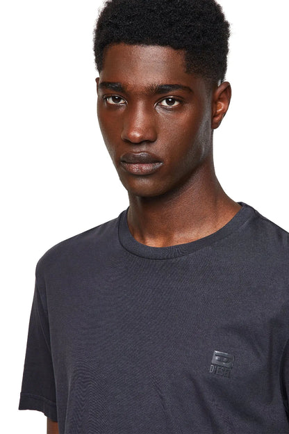Dark Diesel T-shirt close-up with small chest logo and crew neckline