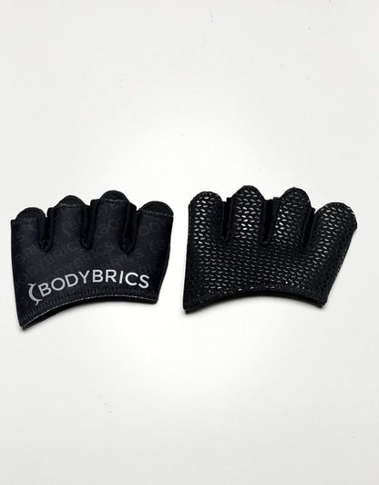 Black fingerless gloves, textured knit palm with thumb and finger holes