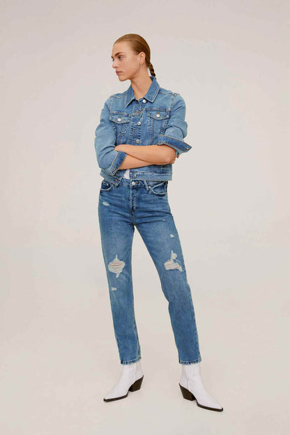 Light blue denim jacket with distressed jeans, button-front and frayed cuffs