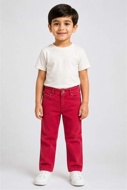 Red denim jeans with button closure and front pockets; child wearing a white T-shirt