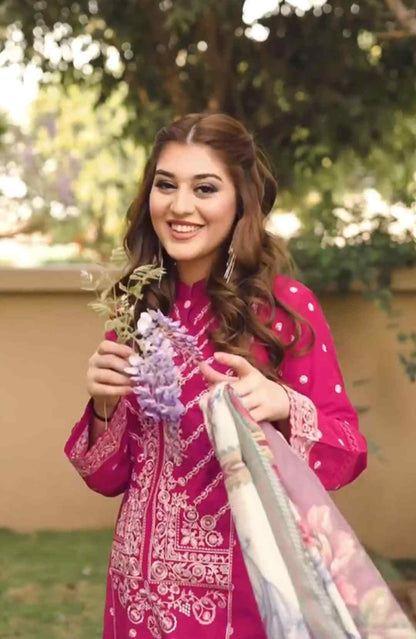 Shocking pink embroidered kurta with matching dupatta, long sleeves, front view smiling