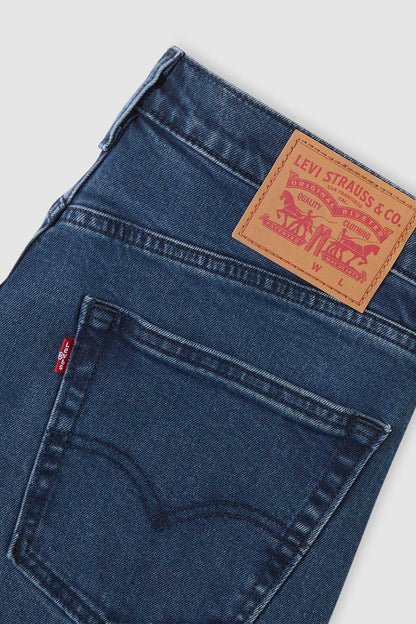 Levi's denim jeans close-up of back pocket stitching and brand patch label