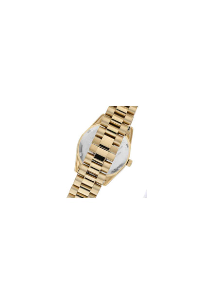 Gold-tone wristwatch close side angle showing smooth case and crystal-studded bezel