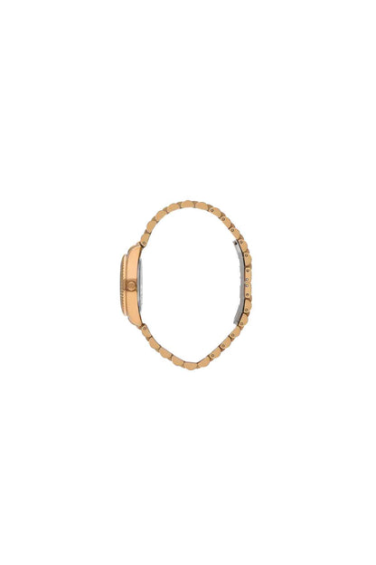 Rose gold tone round watch case and bezel from side view, crown at left