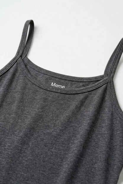 Dark grey camisole tank top neckline with â€œMemeâ€ logo on chest
