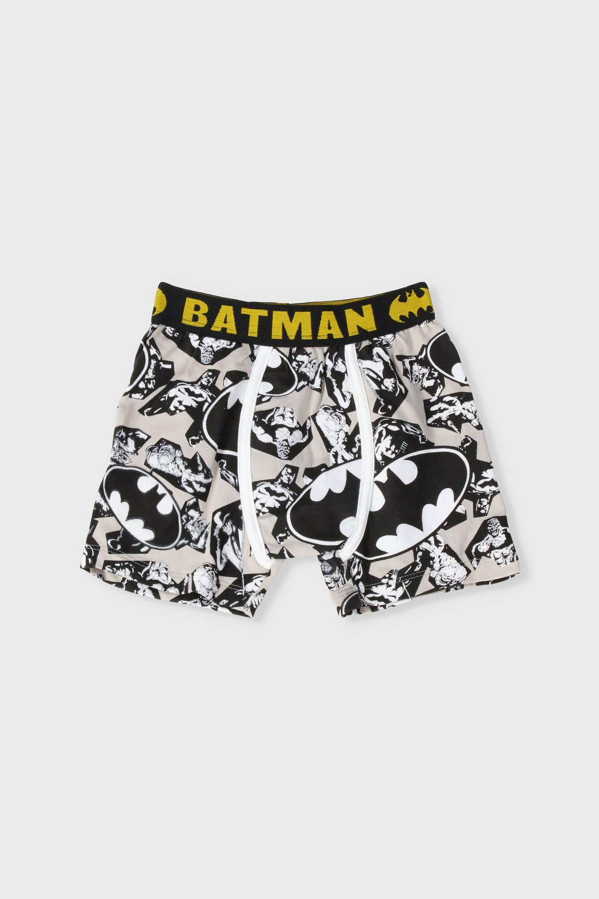 Batman graphic boxer shorts, black and white with yellow “BATMAN” waistband
