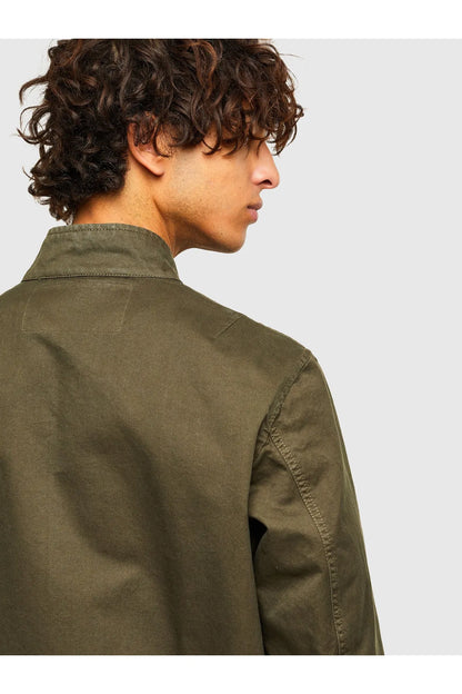 Olive green jacket side view with shoulder seam and sleeve stitching detail