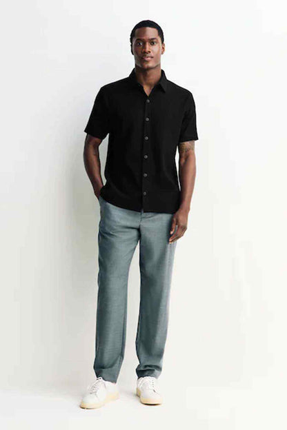 Black short-sleeve button-up shirt with point collar and front buttons