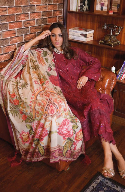 Maroon embroidered kurta set with floral cream dupatta and tassel trim