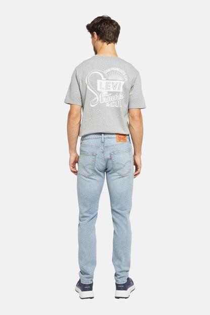 Levi's men's back-graphic grey T-shirt; light-wash straight jeans with orange tag