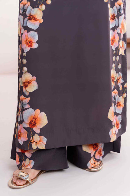 Dark long dress with floral border hem over matching pants