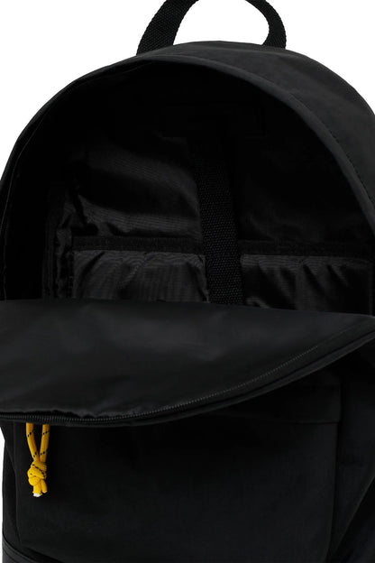Black backpack opened view with front zip pocket and padded shoulder straps
