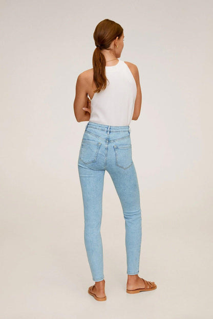 Light blue high-waist skinny denim jeans, back view, patch pockets