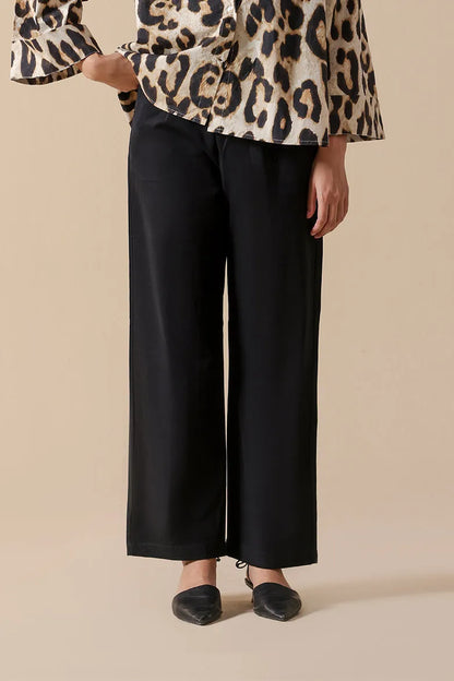 Black wide-leg trousers with cuffed hem and side pockets
