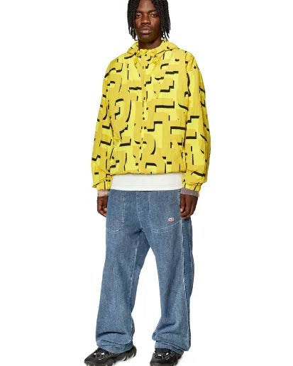 Yellow hooded zip-up hoodie with black abstract pattern and long sleeves