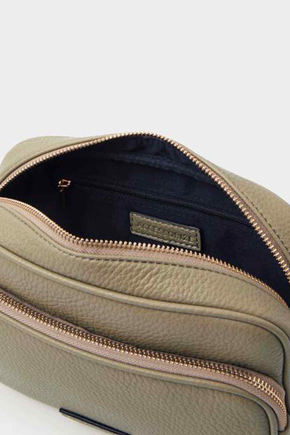 Khaki zip crossbody bag with fabric interior pocket and gold zipper