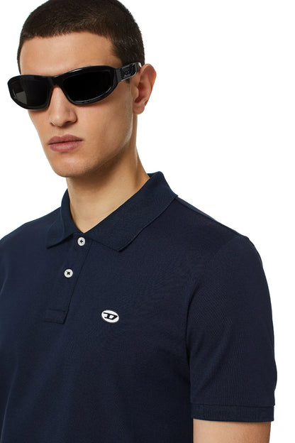 Navy Diesel polo shirt close-up of collar and chest logo