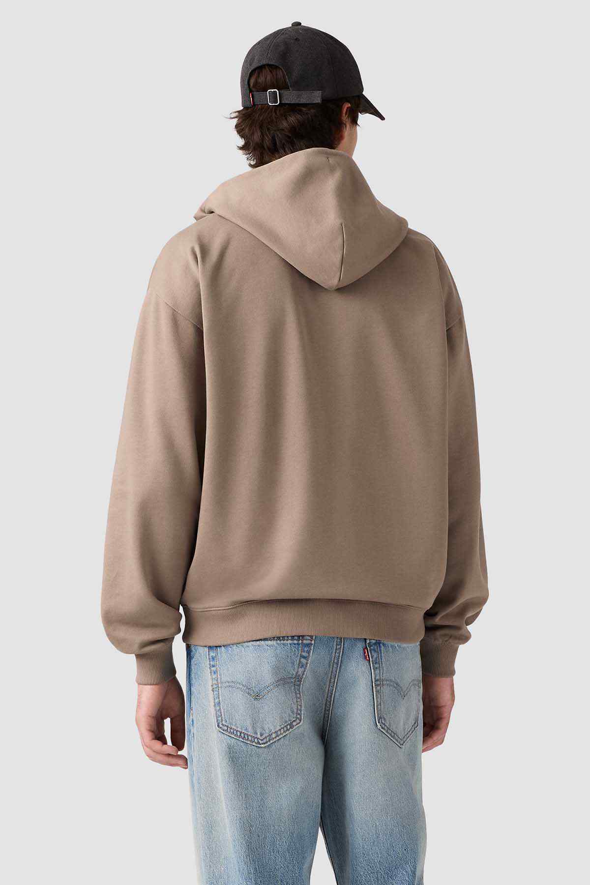 Zip-up hoodie in taupe, with hood and drawstrings, ribbed cuffs, and kangaroo pocket