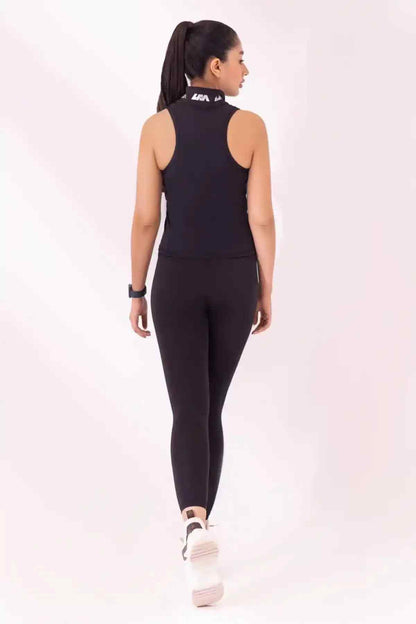 Black sleeveless athletic top and leggings set, back view