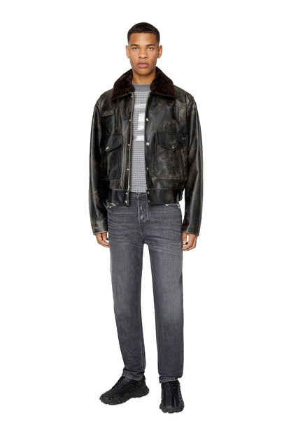 Diesel black leather jacket front view with faux-fur collar and buttoned pockets