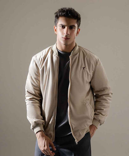 Men's beige bomber jacket with front zipper, stand collar, and small chest logo