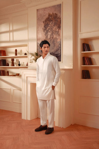 Men's white kurta and pants set, front view with hands at sides