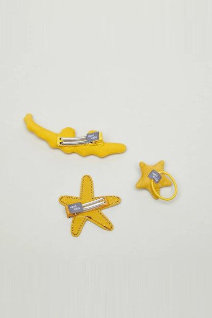 Yellow felt pacifier clips: dolphin and star shapes with metal clasps and rings