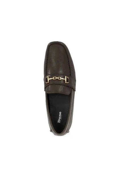 Dark brown loafer with gold-tone buckle, black interior and Dune logo on insole.