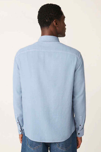 Men's light blue button-up shirt back view with long sleeves and yoke