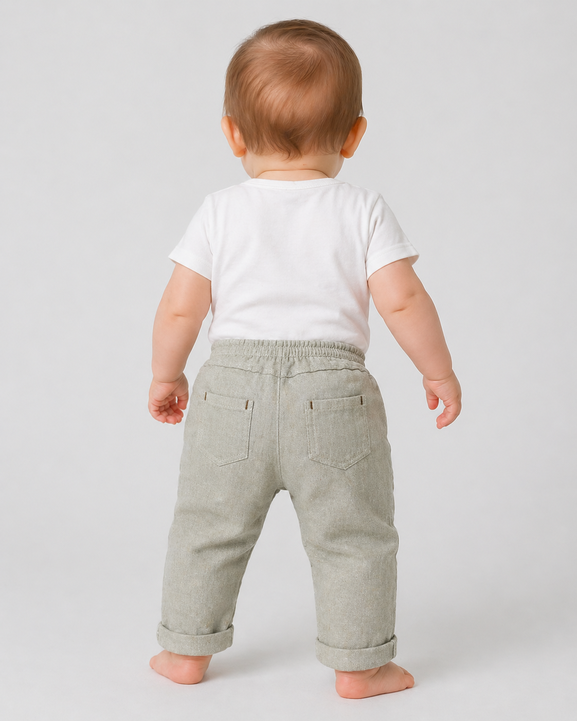 BABYSHOP baby trousers light gray, back view with elastic waist and cuffed hems