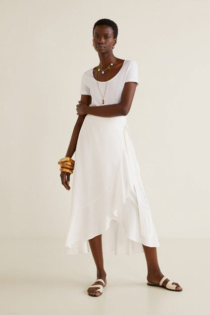 Off-white midi dress with short sleeves and fitted bodice, tiered A-line skirt